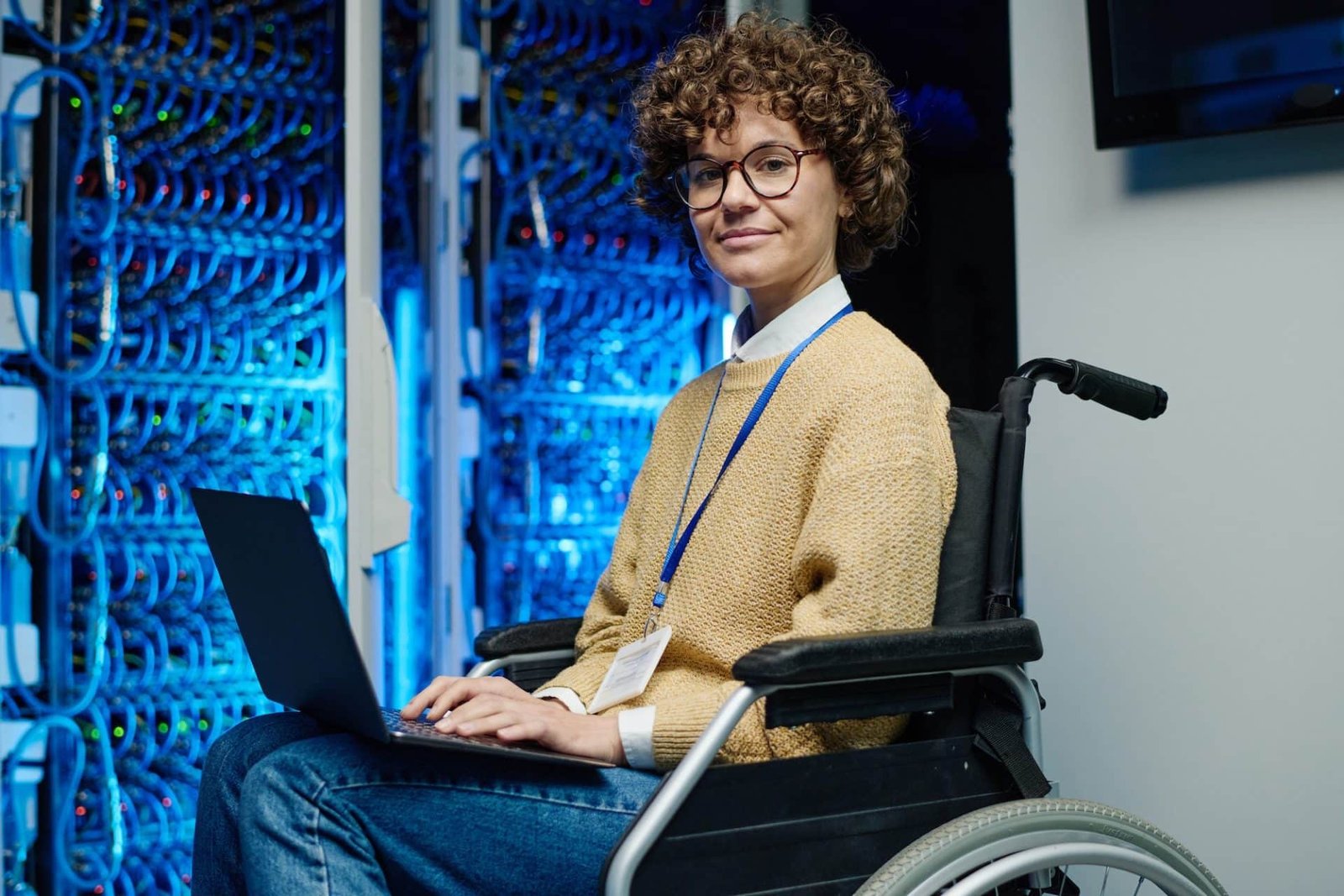 IT engineer in wheelchair managing servers