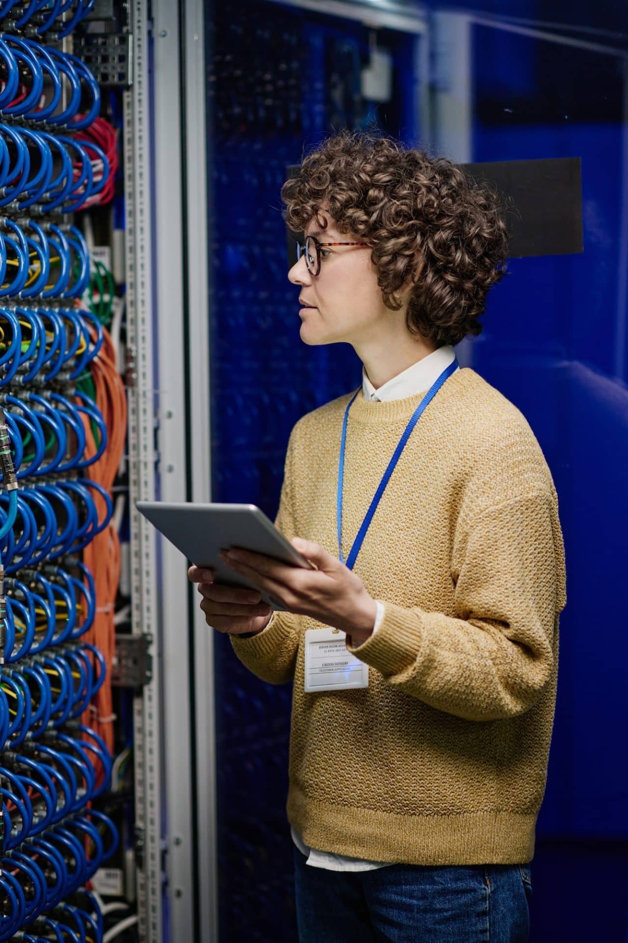 Network engineer working in server room
